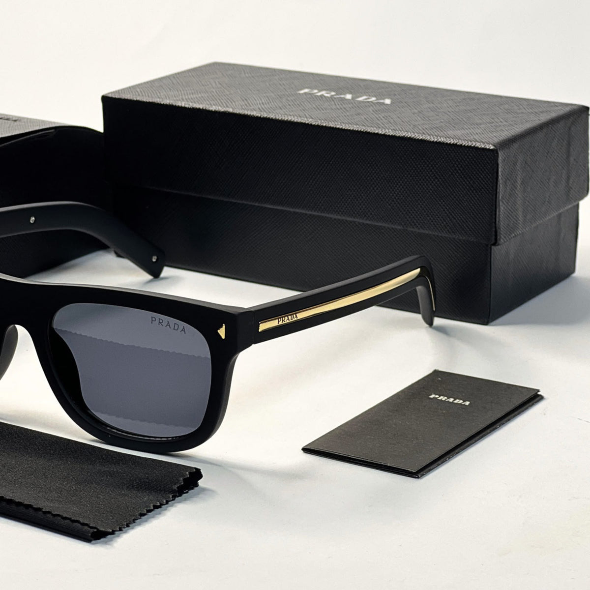 Prada 125 Matt Black Gold