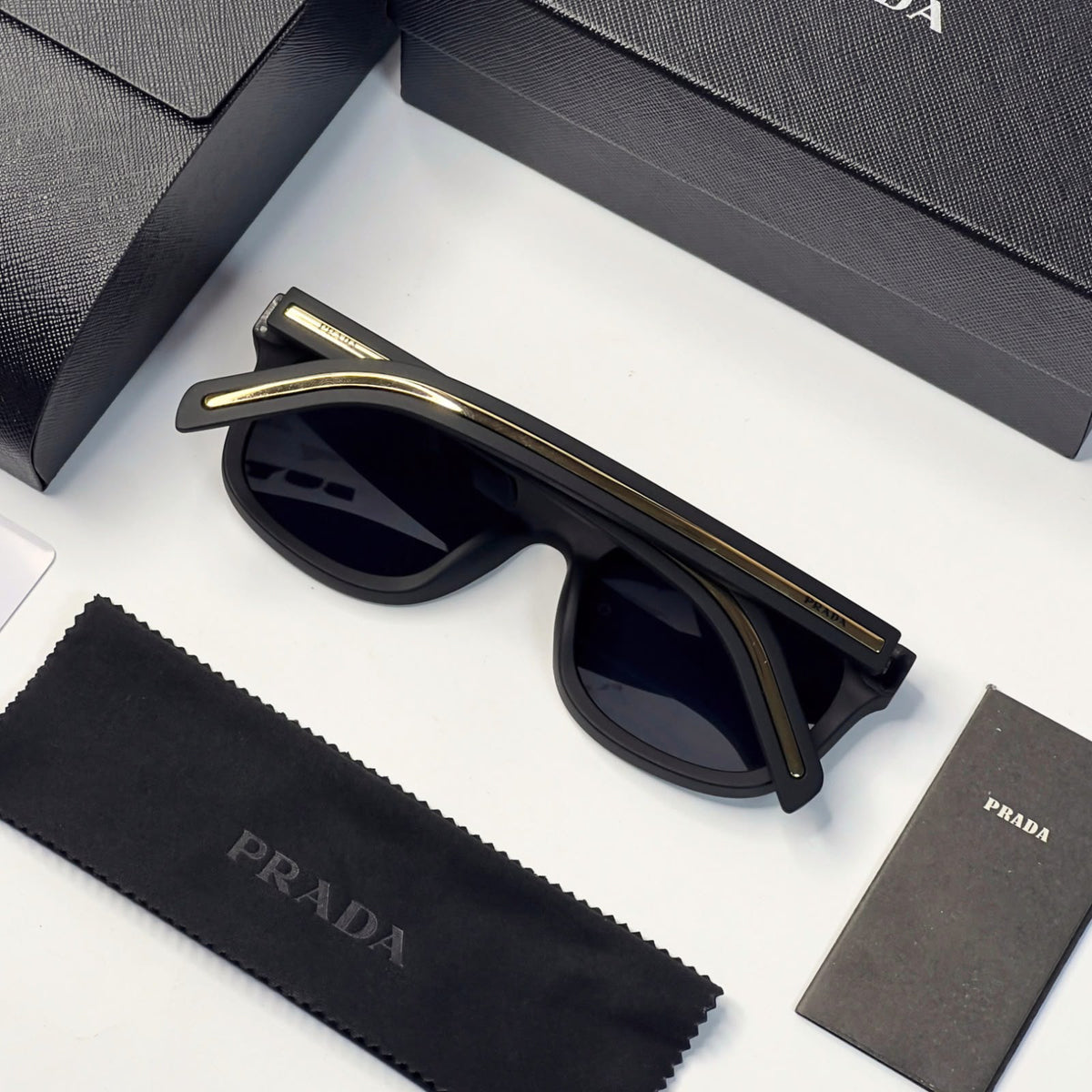 Prada 125 Matt Black Gold