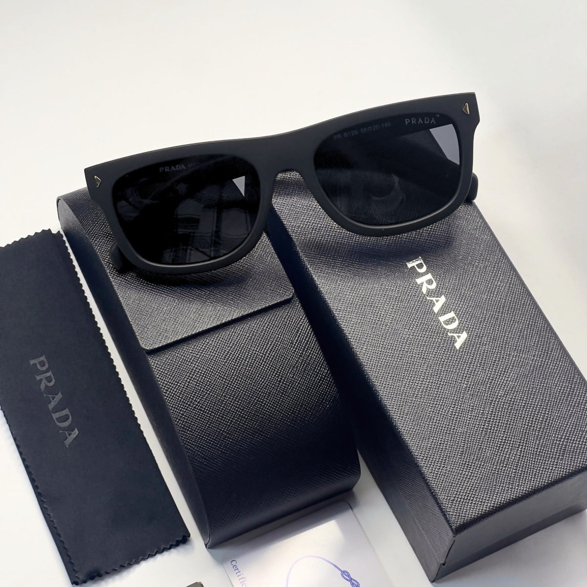 Prada 125 Matt Black Gold